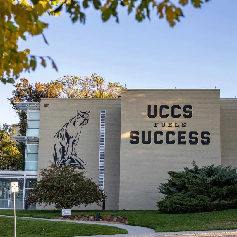 cragmor hall mural that says "UCCS Fuels Success"