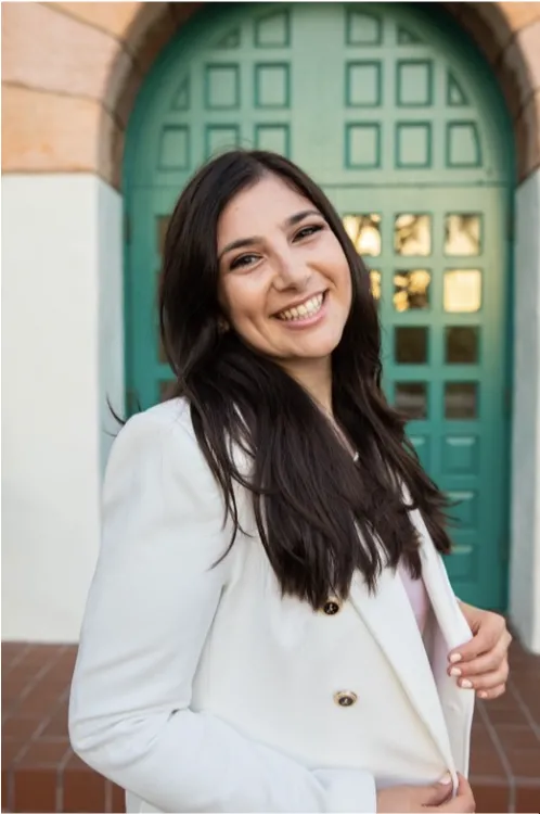 An image of Paige D. Klein smiling at the camera